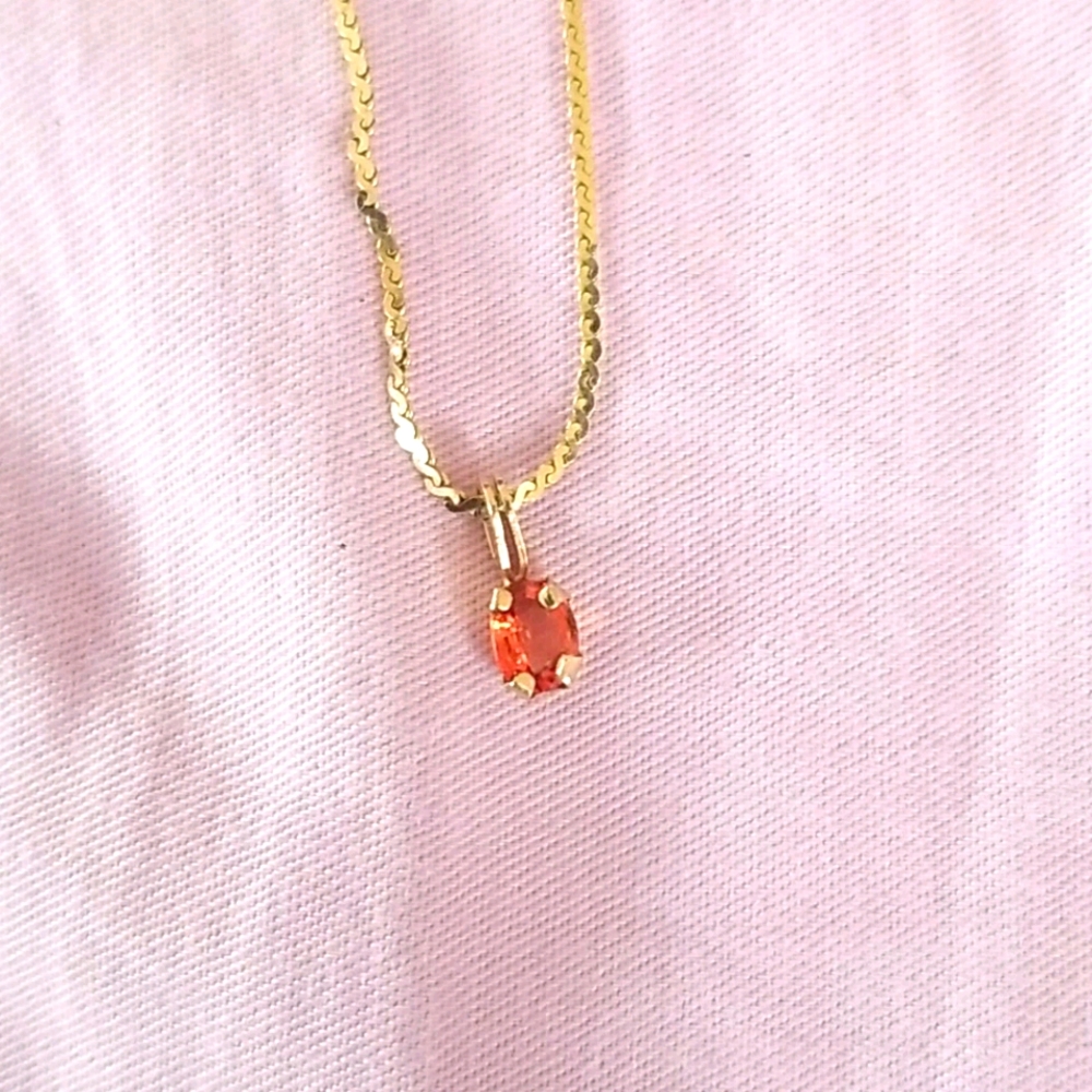 14k 0.6ct orange color sapphire pandent